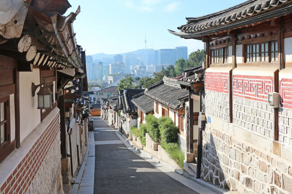 Traditional hanok houses lining an alley in Bukchon Hanok Village, Seoul