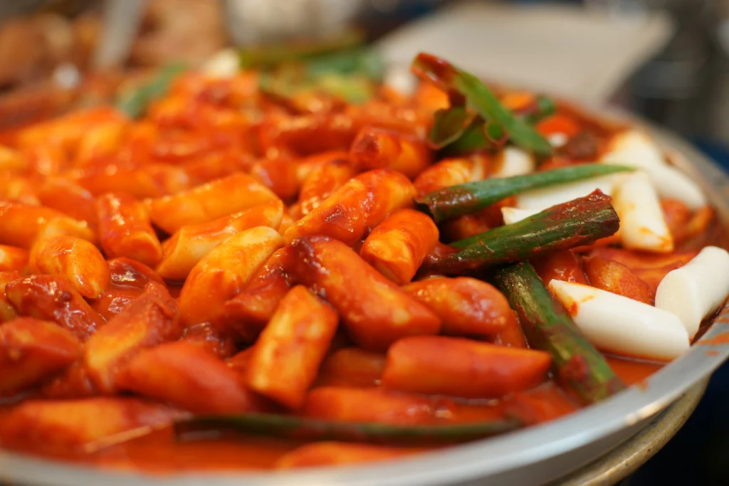 Korean tteokbokki, spicy rice cakes in red gochujang sauce